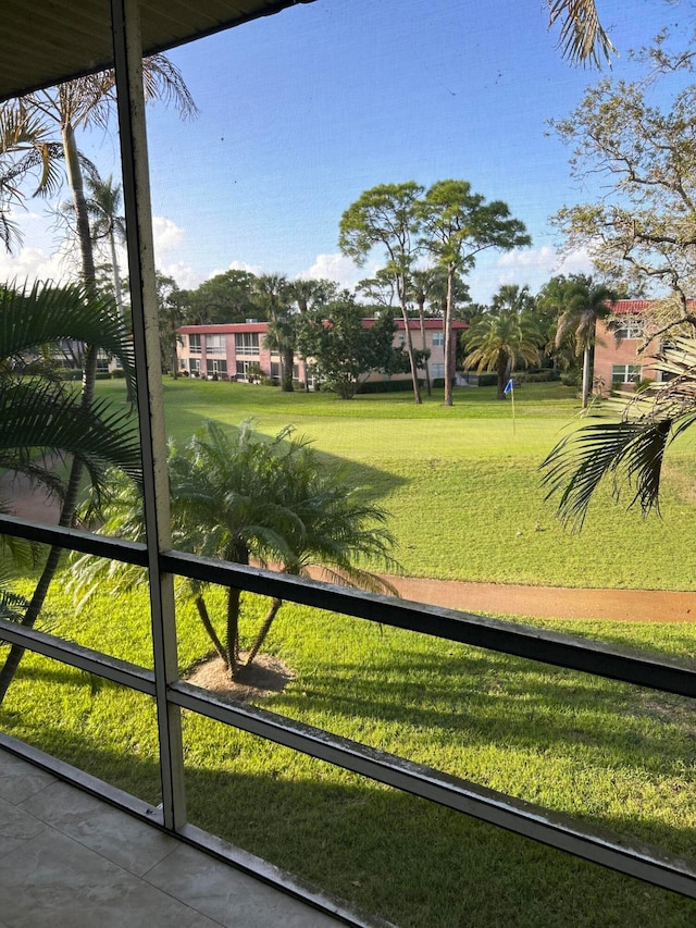 view of home's community featuring a lawn