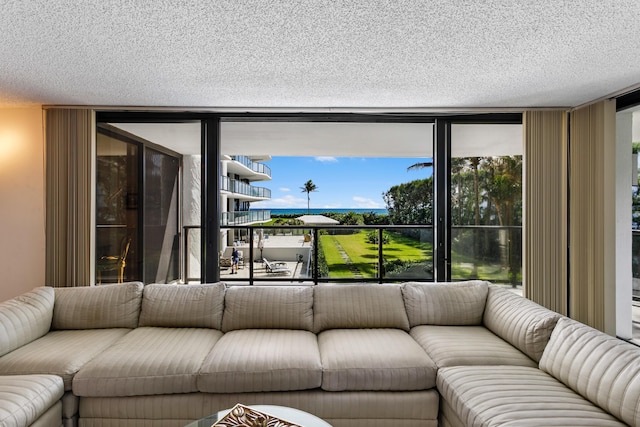 living room with a textured ceiling