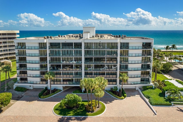 view of building exterior featuring a water view