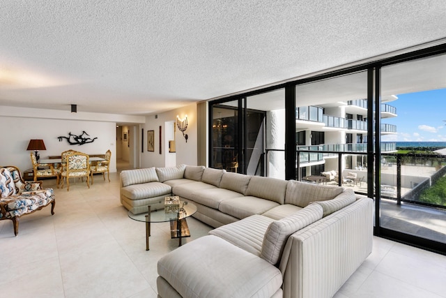 living room with floor to ceiling windows