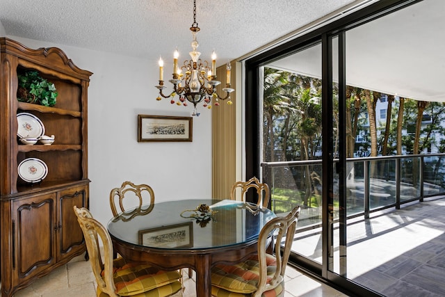 dining space with floor to ceiling windows, light tile patterned floors, a textured ceiling, and a chandelier