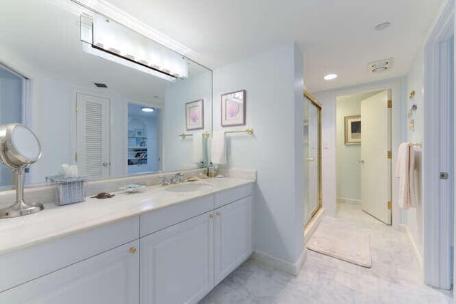 bathroom featuring vanity and walk in shower