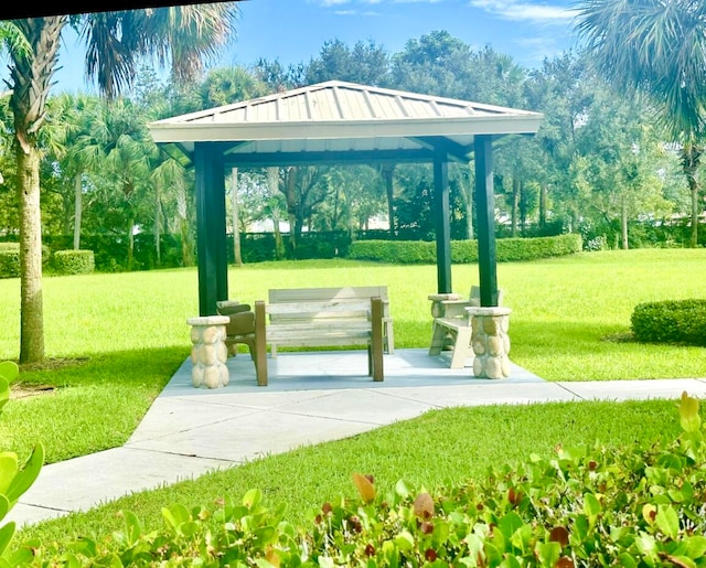 view of home's community with a yard and a gazebo