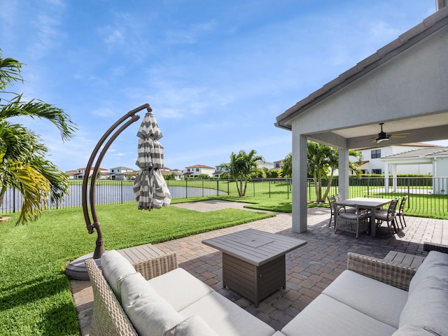 view of patio / terrace featuring an outdoor hangout area and ceiling fan