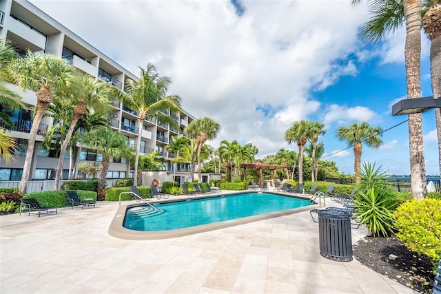 view of swimming pool featuring a patio