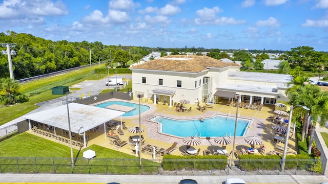 view of pool featuring a yard and a patio area