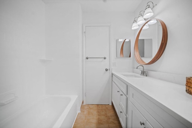 bathroom with tile patterned flooring and vanity