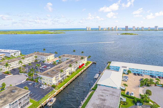 birds eye view of property featuring a water view