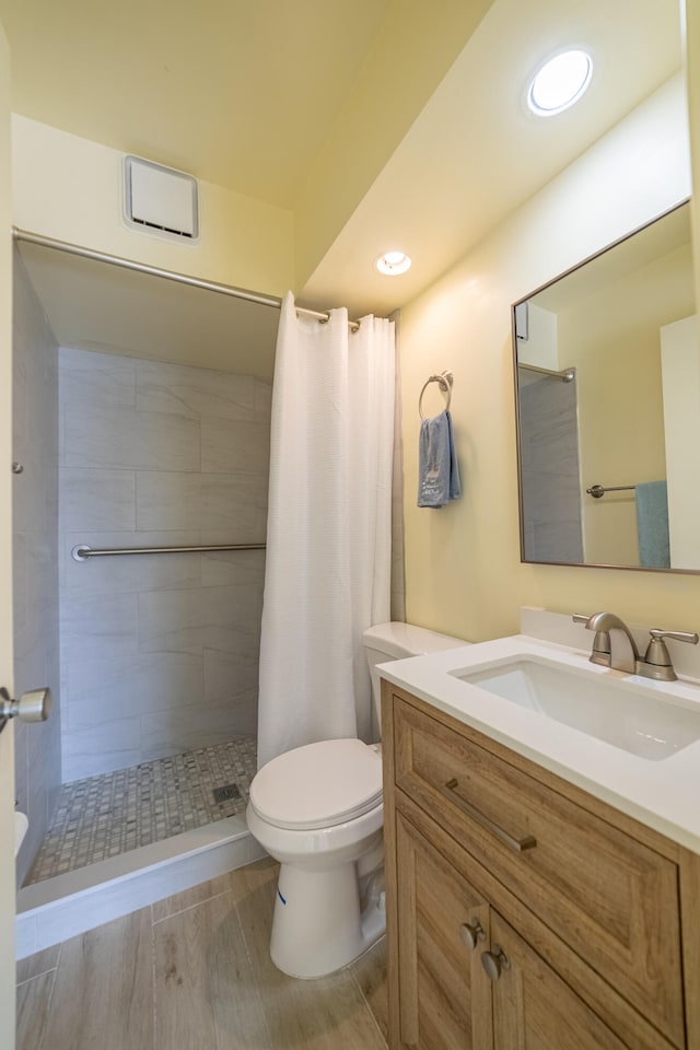 empty room with ceiling fan, light hardwood / wood-style floors, and a textured ceiling