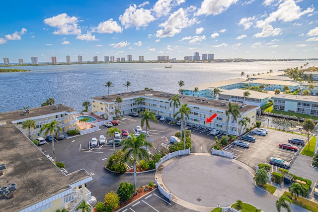 birds eye view of property featuring a water view