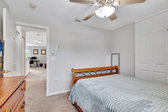 8951 Alexandra Cir, Wellington, FL 33414 - bedroom featuring light carpet, a desk, and a ceiling fan