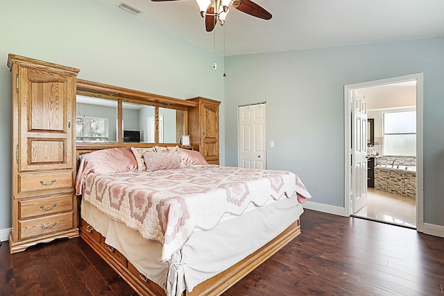 bedroom with dark hardwood / wood-style flooring, ceiling fan, vaulted ceiling, and a closet