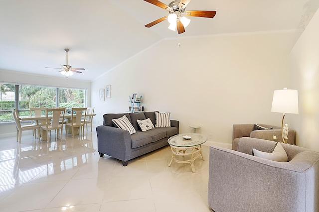 tiled living room with ceiling fan, crown molding, and lofted ceiling