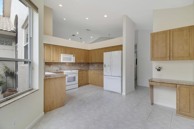 kitchen with light stone counters, white appliances, decorative backsplash, and light tile patterned floors