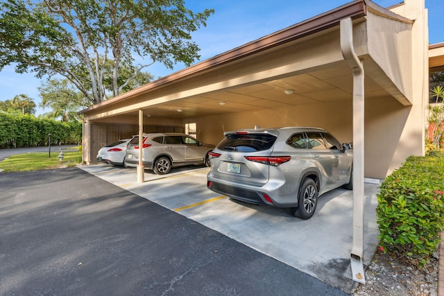 view of parking with a carport