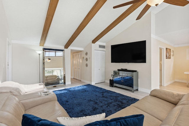 living room featuring light hardwood / wood-style floors, beamed ceiling, high vaulted ceiling, and ceiling fan