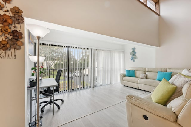 home office with hardwood / wood-style floors