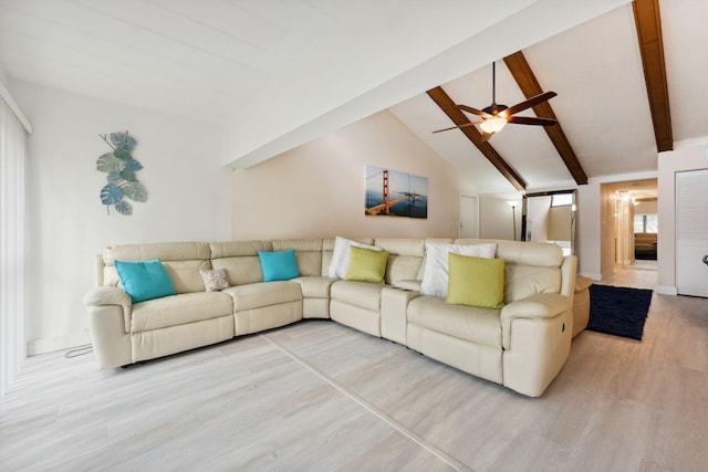 living room with ceiling fan, lofted ceiling with beams, and light hardwood / wood-style flooring