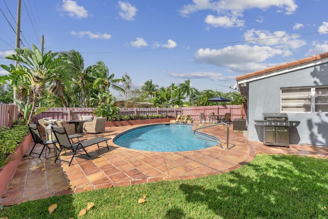 view of pool featuring a patio area, central AC unit, a grill, and a lawn