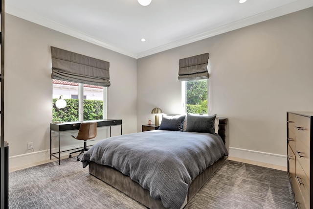 bedroom with ornamental molding