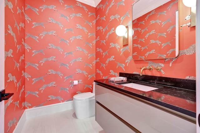 bathroom with vanity, crown molding, toilet, and tile patterned floors