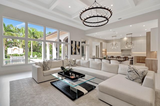 tiled living room featuring beam ceiling, coffered ceiling, and a healthy amount of sunlight