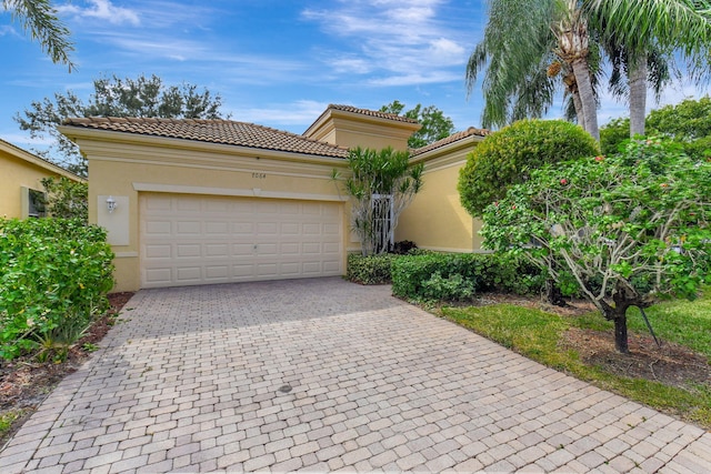 view of front of property with a garage