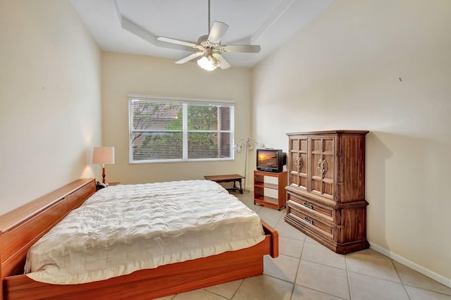 bedroom with light tile patterned flooring and ceiling fan