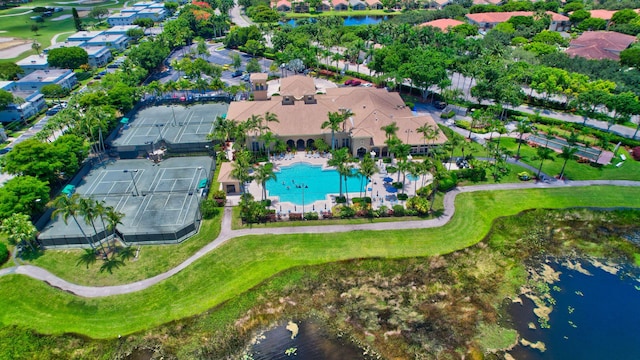 birds eye view of property featuring a water view