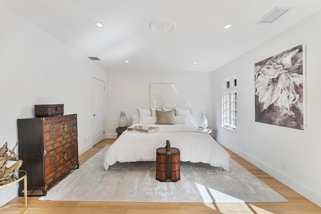 bedroom featuring light hardwood / wood-style floors