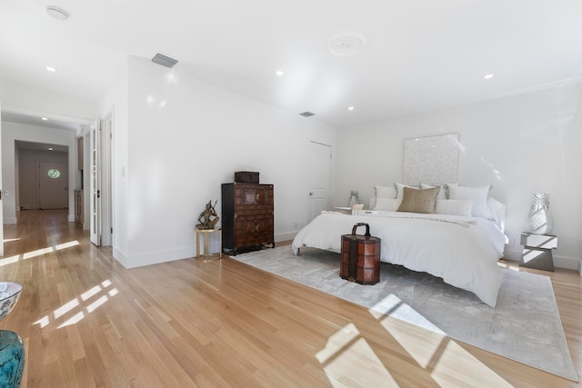 bedroom featuring light hardwood / wood-style floors