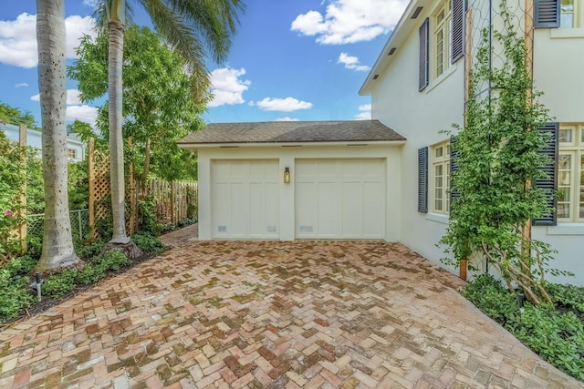 view of patio / terrace with a garage