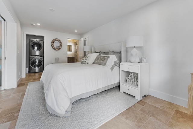 bedroom with stacked washer / drying machine