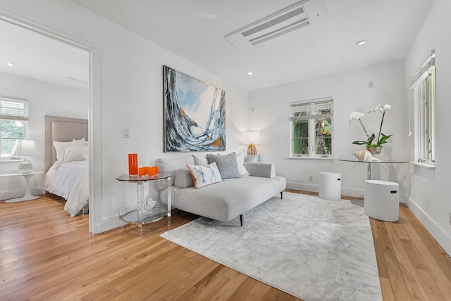 bedroom with hardwood / wood-style floors