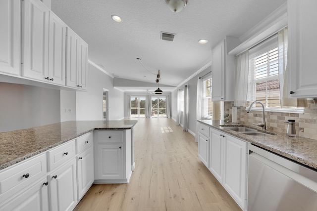 kitchen with white cabinetry, light wood-type flooring, dishwasher, crown molding, and sink