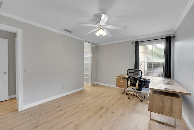 home office featuring ornamental molding, light hardwood / wood-style floors, and ceiling fan