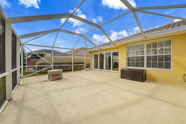 view of patio / terrace with a lanai