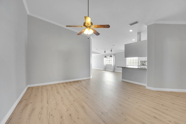 unfurnished living room featuring light hardwood / wood-style floors, crown molding, a textured ceiling, and ceiling fan