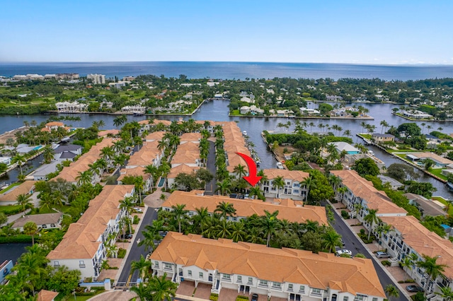 aerial view featuring a residential view and a water view