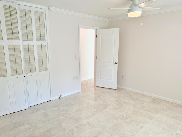 unfurnished bedroom featuring a closet, light tile patterned floors, crown molding, and ceiling fan