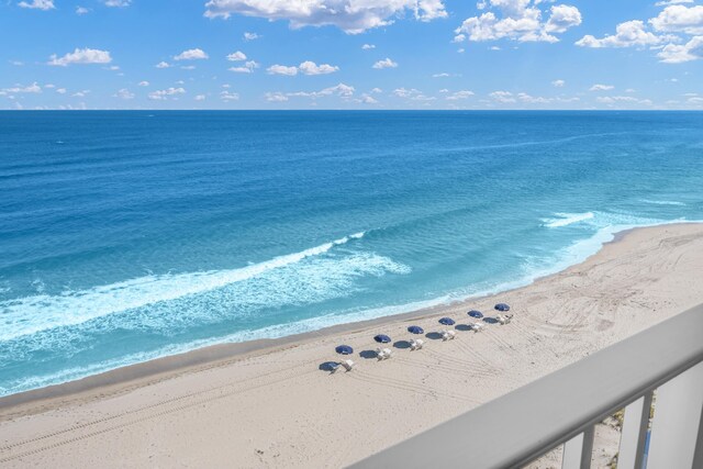 view of water feature with a beach view