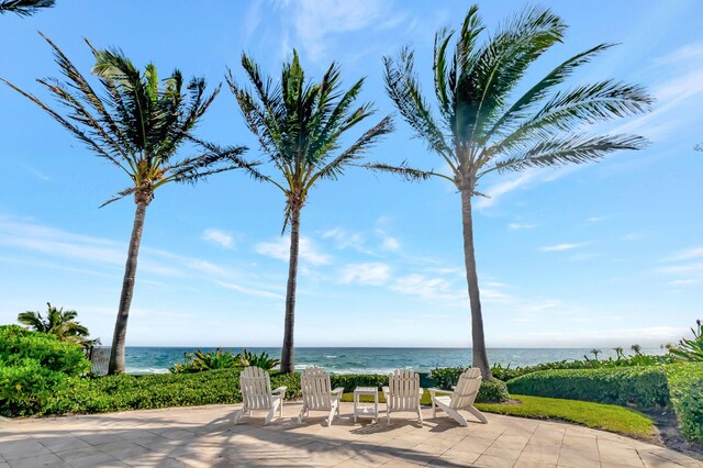 view of patio featuring a water view