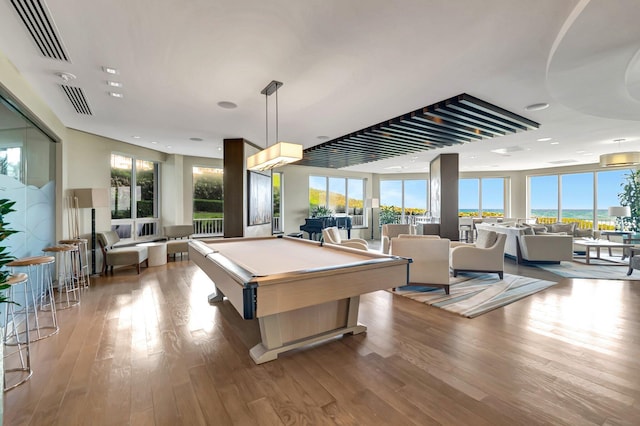 playroom with visible vents, wood finished floors, and pool table