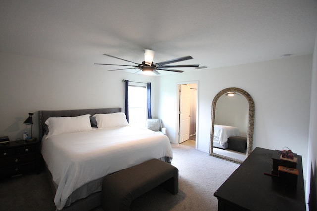 bedroom with light carpet and ceiling fan