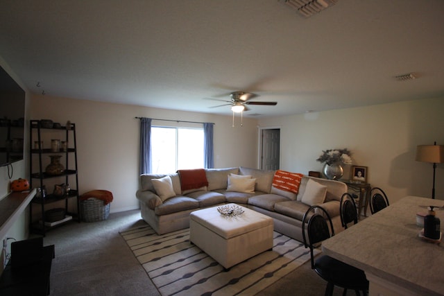 living room with carpet flooring and ceiling fan