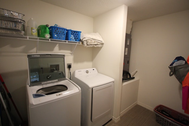 laundry room featuring washing machine and clothes dryer