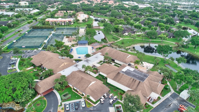 drone / aerial view with a water view