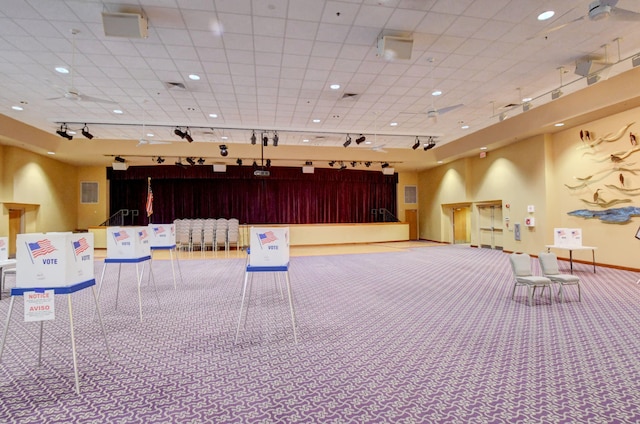 misc room featuring visible vents, baseboards, carpet floors, recessed lighting, and track lighting