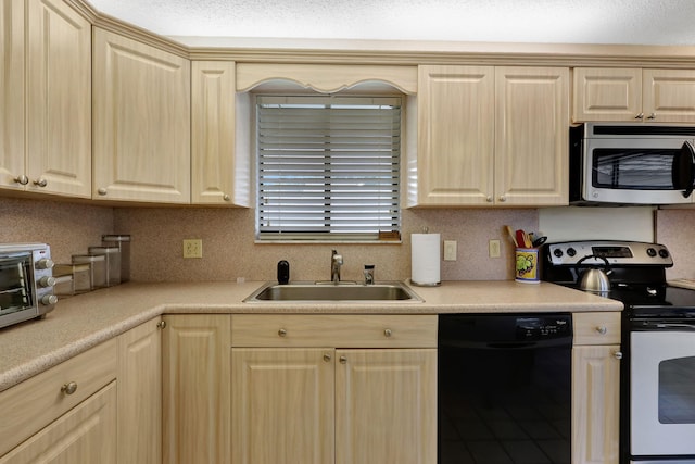 kitchen with a sink, stainless steel appliances, decorative backsplash, and light brown cabinetry