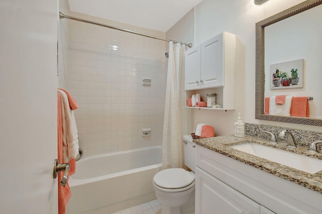 full bathroom with toilet, tile patterned floors, vanity, and shower / bath combo with shower curtain